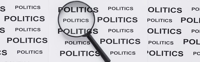afbeelding Top View Magnifying Glass With Politics